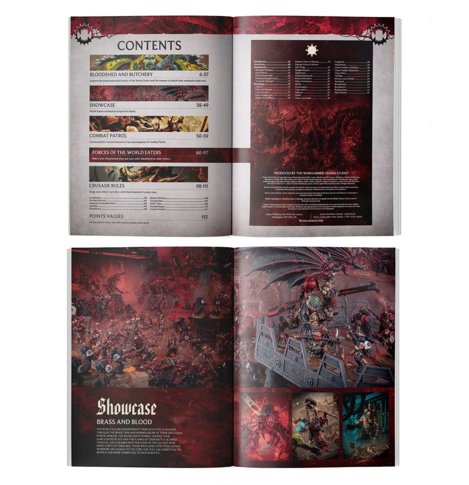 Warhammer 40,000 - World Eaters - Codex - Open Warhammer 40,000 World Eaters Codex showing detailed, colorful pages with red and black themed artwork and text layouts.