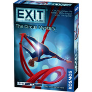 EXIT: The Circus Mystery - The Game box titled The Circus Mystery, featuring an acrobat suspended on red silks against a spotlight background.