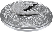 D&D Nolzur's Marvelous Miniatures: Crocodile - Gray unpainted resin miniature of a snarling crocodile on a textured round base.