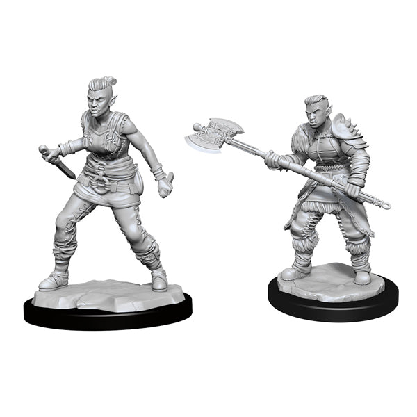 D&D Nolzur's Marvelous Miniatures: Orc Barbarian Female - Two unpainted gray resin miniatures of orc barbarians, one female wielding a mace and the other male holding a large axe,.