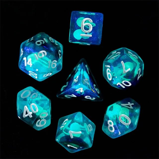Jellyfish Dice Set - Translucent blue polyhedral dice set with white numbers, including d4, d6, d8, d10, d12, d20, and percentile dice.