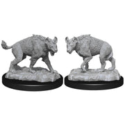 WizKids Deep Cuts Miniatures: Hyenas - Two gray unpainted hyena miniatures with detailed fur texture on round black bases.