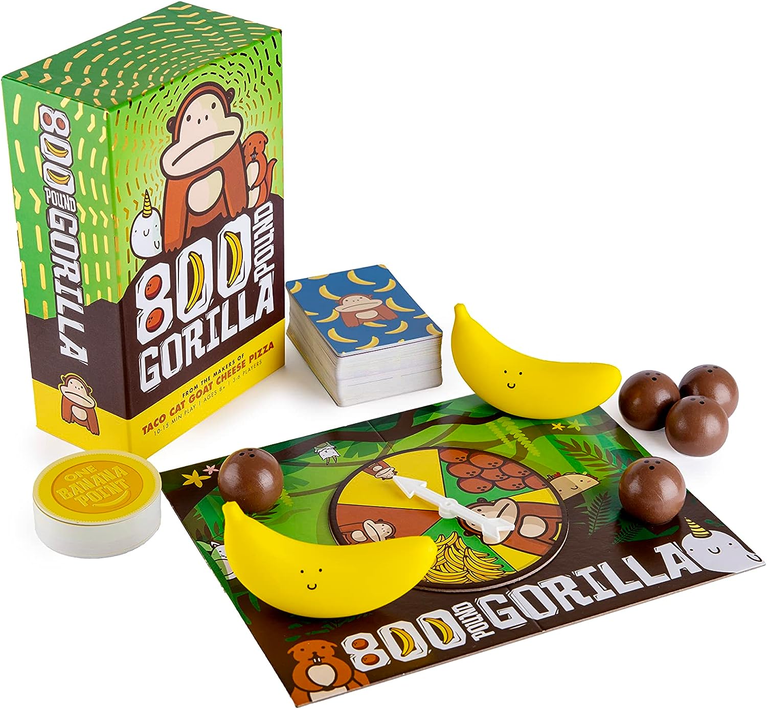 800 Pound Gorilla - 800 Pound Gorilla game box with colorful cards, banana-shaped pieces, round brown game tokens, and a vibrant game mat with.