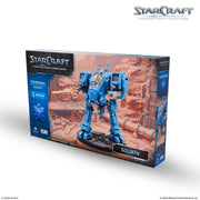 StarCraft TMG: Terran - Goliath (PREORDER) - Blue and gray robotic Goliath figure with heavy armor and weaponry on tabletop wargame box.