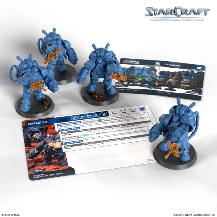 StarCraft TMG: Terran - Marauder (PREORDER) - Four detailed blue plastic Terran Marauder miniatures with orange accents, accompanied by gameplay cards and stats sheets.