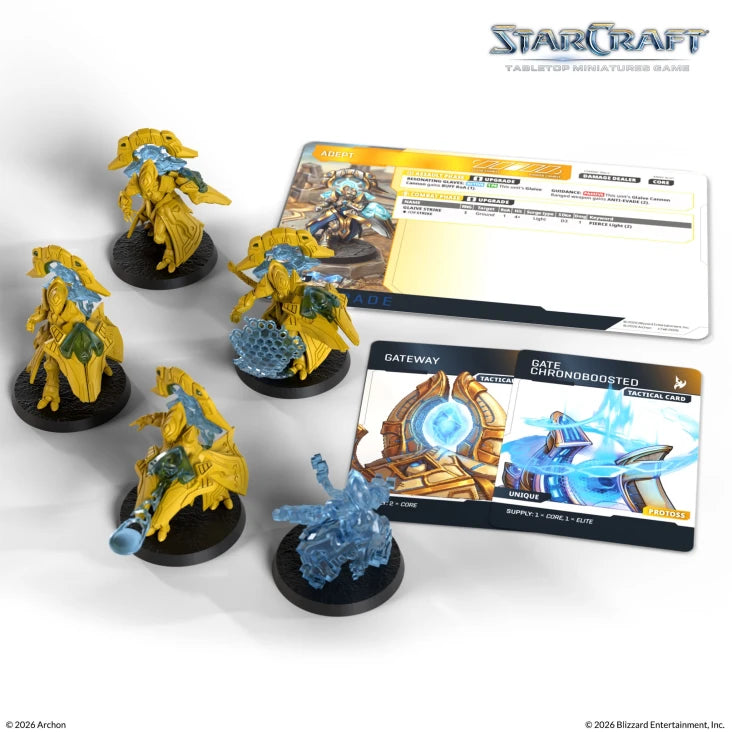 StarCraft TMG: Protoss - Adept (PREORDER) - Set of six intricately detailed Protoss Adept miniatures in yellow and blue armor, with accompanying game cards featuring.
