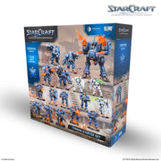 StarCraft TMG: Terran Starter Set (PREORDER) - StarCraft Terran Starter Set with blue and orange mech action figures displayed in a window box packaging.