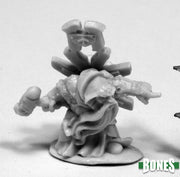 Ivar, Dwarf Priest - Gray unpainted resin miniature of a dwarf priest holding a hammer with a long braided beard and ornate robes.