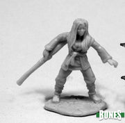 Xiao Liu, Female Monk - Gray resin miniature of a female monk in martial stance holding a staff, detailed robes and long hair.
