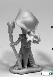 Bonesylvanians - Mel - Unpainted gray resin miniature of a skeletal wizard figure holding a twisted staff with a large skull-shaped helmet.