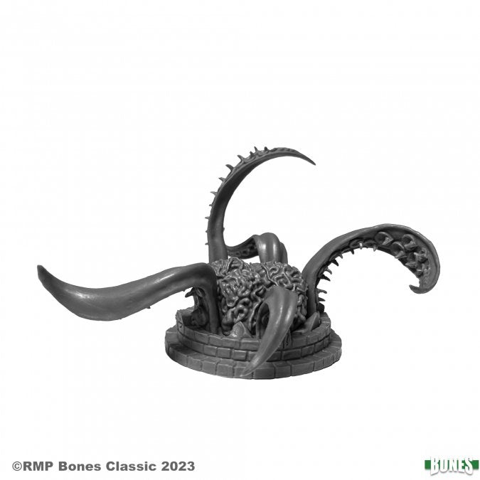 The Thing in the Well - Black fantasy miniature featuring tentacles with suction cups emerging from a textured circular base.