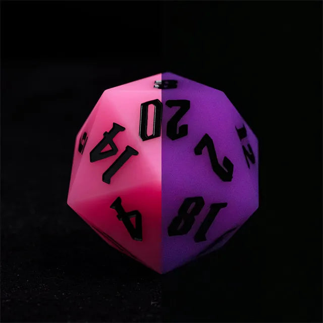 Giant Bouncy D20 - Glow In The Dark Pink - Giant pink 20-sided polyhedral dice with black numbers, glow-in-the-dark finish, rubbery texture.