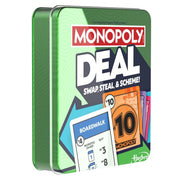 Monopoly Deal Tin (PREORDER) - Green rectangular metal tin with Monopoly Deal branding, colorful game card illustrations, and Hasbro logo.