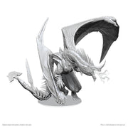 Dungeons & Dragons: Nolzur's Marvelous Minis: Anthradusk, Ancient Blue Dragon - Unpainted gray plastic miniature of a large ancient blue dragon with spread wings and detailed scales.
