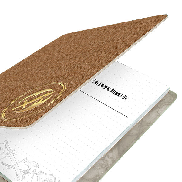 D&D Class Premium Campaign Journal - Fighter Class (PREORDER) - Brown textured hardcover journal with embossed gold emblem and dotted grid internal pages.