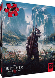The Witcher 1000 Piece Puzzle - The Witcher 1000-piece puzzle box featuring a detailed fantasy landscape with a lone figure holding swords against towering.