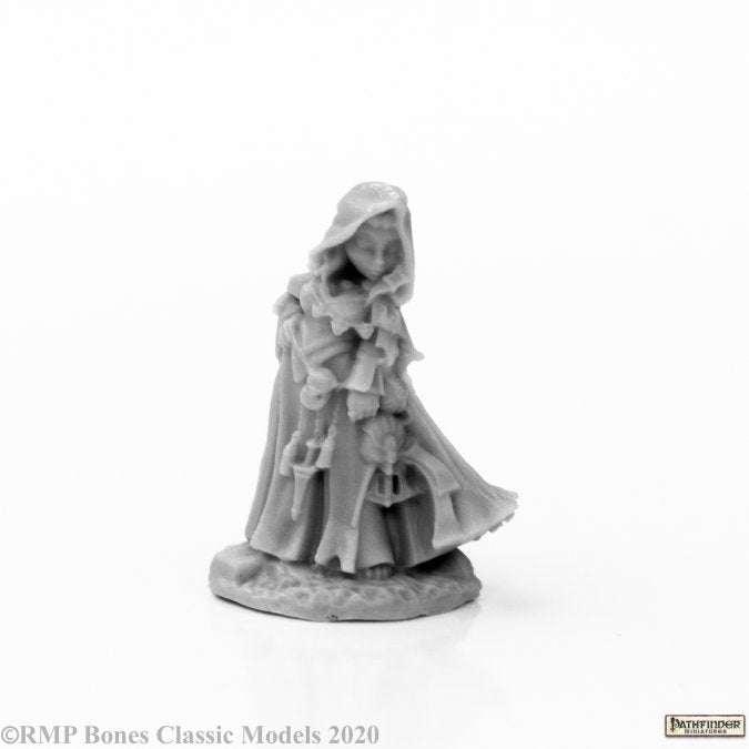 Enora, Iconic Arcanist - Gray miniature figure of a hooded, robed mage with layered clothing standing on a textured base.