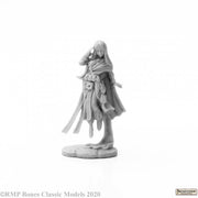 Rivani, Iconic Psychic - Unpainted gray resin miniature of a female psychic figure with flowing cloak and layered robes standing on a round base.