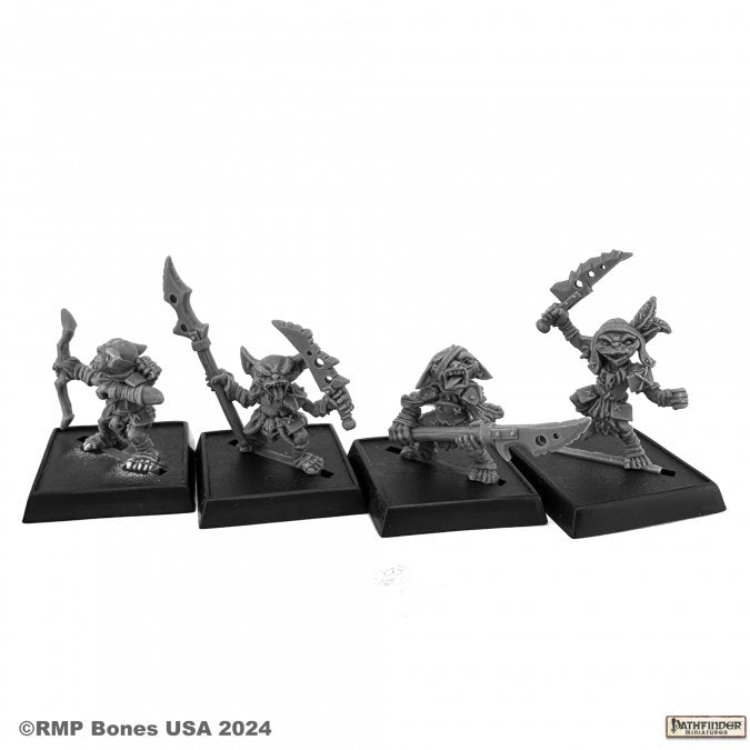 Pathfinder Goblin Warriors (4) - Set of four gray plastic goblin warrior miniatures, each wielding different weapons, posed dynamically on square bases.