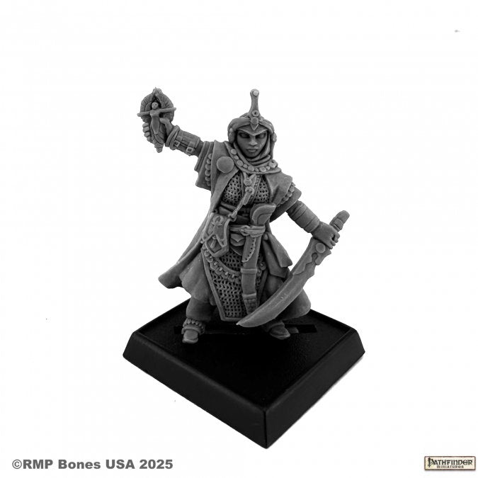 Kyra, Iconic Human Cleric - Gray resin miniature of a female cleric holding a lantern in one hand and a sword in the other, wearing a detailed robe and.