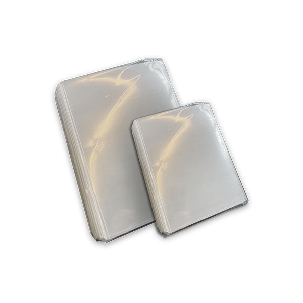 Valheim: Card Sleeves (PREORDER) - Clear glossy plastic card sleeves in two sizes stacked, designed for protecting cards.