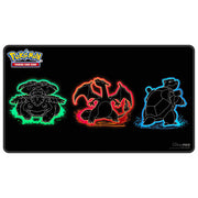 Ultra Pro Playmat: Foil Pokémon - Neon Kanto (PREORDER) - Black rectangular playmat with neon-outlined Venusaur, Charizard, and Blastoise centered in green, red, and blue hues.