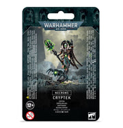 Warhammer 40,000 - Necrons - Cryptek - Warhammer 40,000 Necrons Cryptek miniature blister pack with green energy staff and metallic skeletal figure.