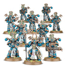 Warhammer 40,000 - Thousand Sons - Rubric Marines - Ten detailed Thousand Sons Rubric Marines miniatures in blue and gold power armor with ornate helmets and weapons on.