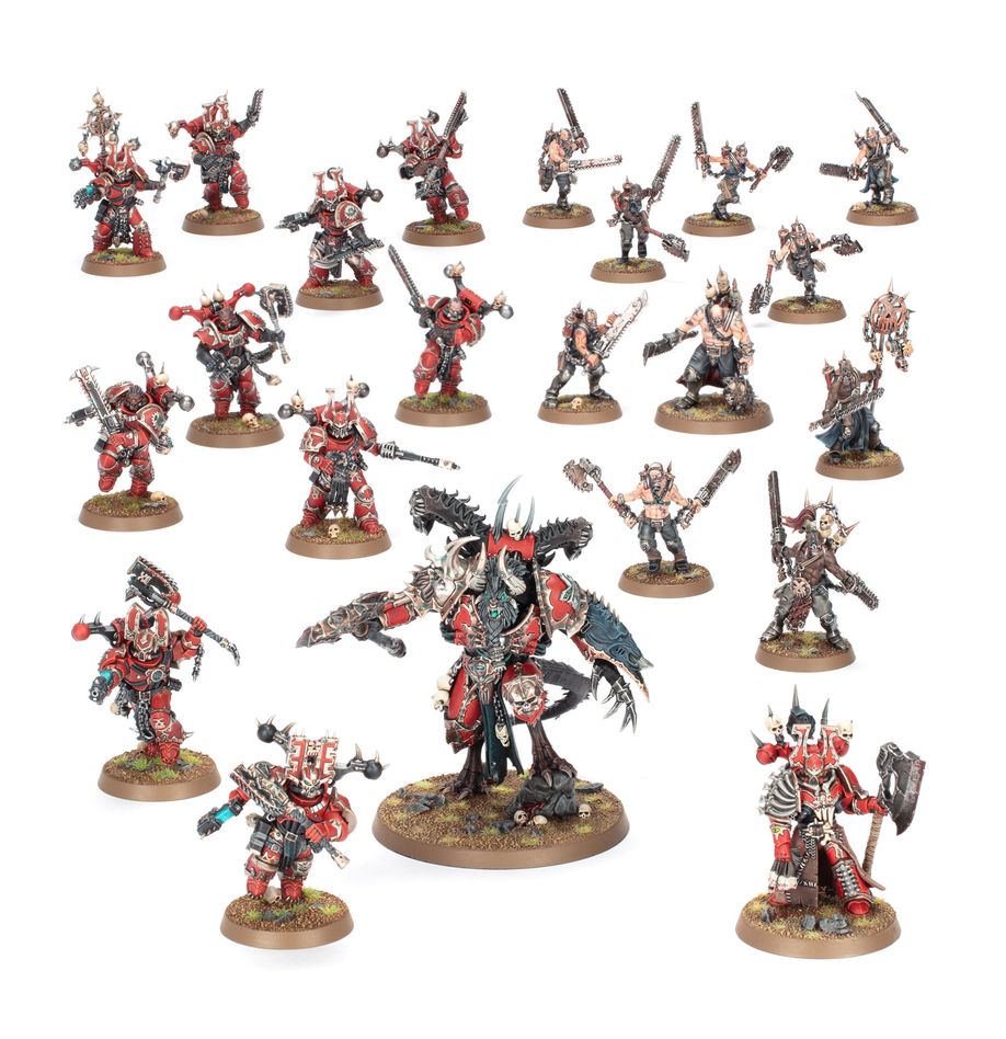 Warhammer 40,000 - World Eaters - Combat Patrol - Set of intricately detailed Warhammer 40,000 World Eaters miniatures in red and silver armor with weapons and dynamic poses.