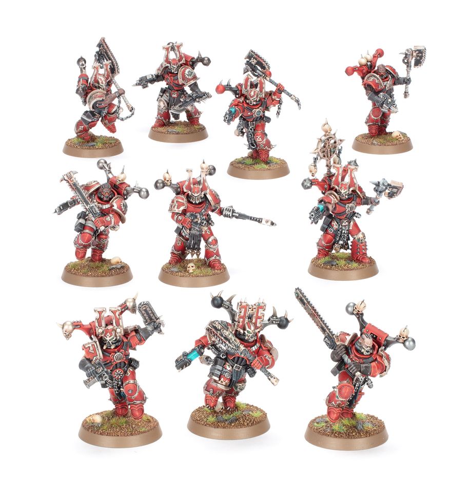 Warhammer 40,000 - World Eaters - Combat Patrol - Ten red-armored Warhammer 40K World Eaters miniatures armed with melee weapons and guns on textured bases.