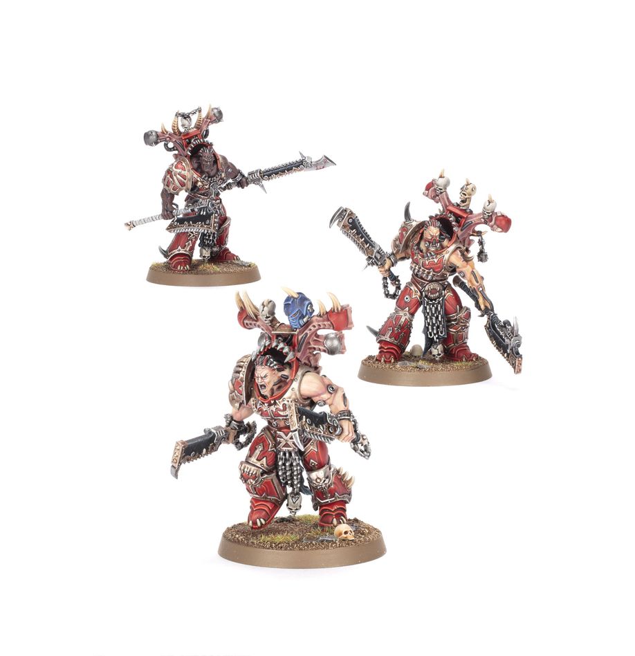 Warhammer 40,000 - World Eaters - Gorestorm Slaughterpack Battleforce - Three detailed Warhammer 40K miniatures featuring armored warriors in red and metallic armor with spiked helmets and.