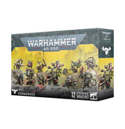 Warhammer 40,000 - Orks - Kommandos - Boxed set of Warhammer 40,000 Orks Kommandos miniatures with detailed green-skinned figures wielding weapons and wearing.