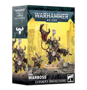 Warhammer 40,000 - Orks - Warboss (PREORDER) - Warhammer 40,000 Orks Warboss box art featuring a large green armored Ork wielding weapons amid a rocky yellow battlefield.