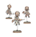 Warhammer Age of Sigmar - Kharadron Overlords - Grundstok Trailblazers Spearhead - Three intricately detailed steampunk-style miniatures with copper armor, mechanical limbs, and jetpacks on round bases.