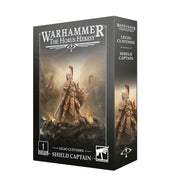 Warhammer: The Horus Heresy - Legio Custodes - Shield Captain (PREORDER) - Warhammer Horus Heresy Legio Custodes Shield Captain miniature box with gold-armored warrior wielding a spear and shield on.