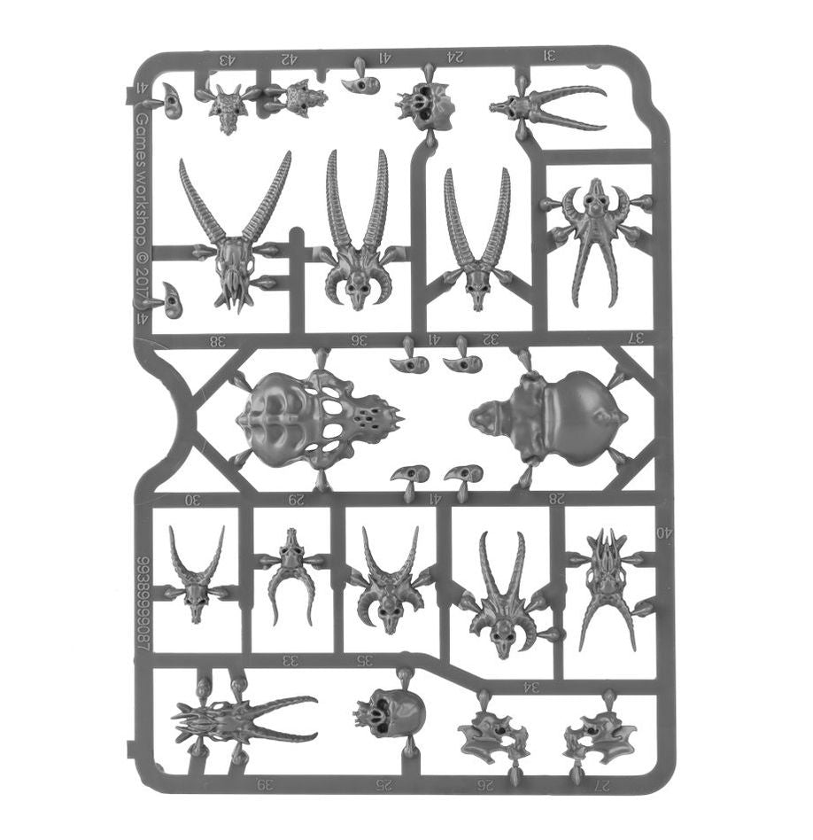 Citadel - Skulls - Gray plastic sprue with miniature skulls and horned skull decorations for Warhammer 40K models.