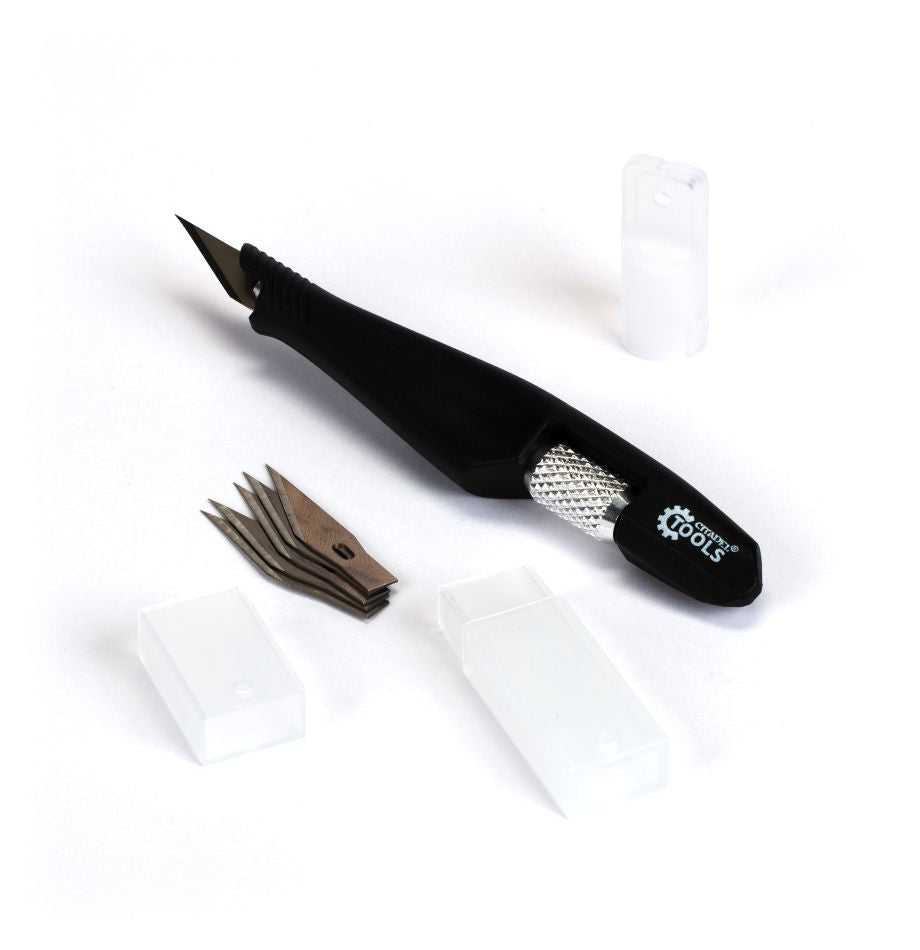 Citadel Tools - Knife - Black precision knife with textured silver grip and multiple interchangeable blades with white plastic blade covers.