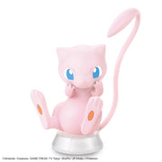 Pokémon Model Kit Quick!! - Mew - Pink Mew model kit with large blue eyes, long curved tail, and seated pose on clear round base.