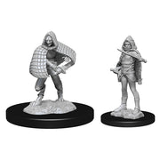 D&D Nolzur's Marvelous Miniatures: Darkling Elder & Darklings - Unpainted gray plastic miniature of a cloaked humanoid with raised arm, next to a smaller hooded figure wielding a curved.
