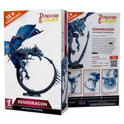Dungeons & Lasers: Xenodragon (Unpainted) - Unpainted detailed miniature of a dragon with wings spread, perched on a circular base, in dark blue resin.