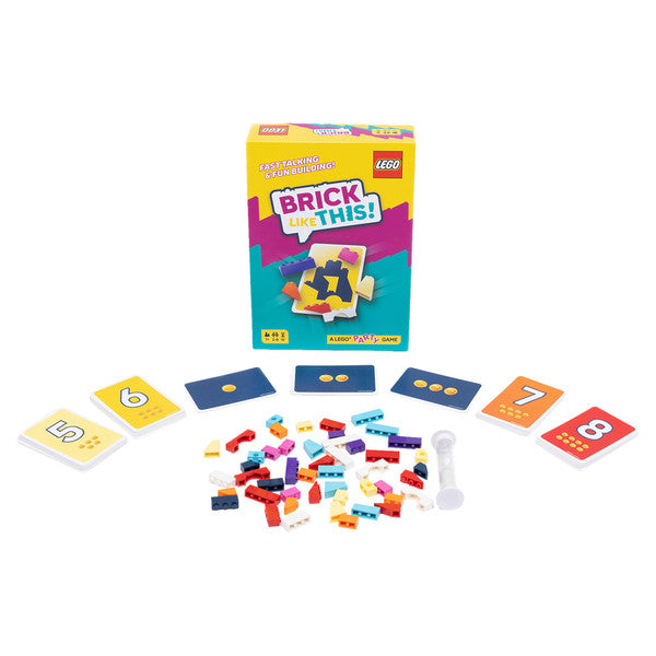 Brick Like This - Colorful plastic brick pieces with numbers on rectangular cards and a yellow box labeled Brick Like This party game.