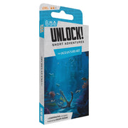 UNLOCK! Short: The Ocean's Heart - Compact rectangular card game box with underwater scene, showing a diver’s legs and ocean wildlife in blue tones.