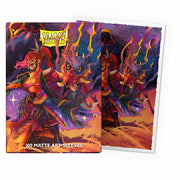 Dragon Shield Sleeves: Standard Matte Art - The Fallen 100CT - Colorful card sleeves featuring a fiery red dragon and a warrior woman in a dynamic fantasy scene with purple and orange.