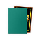 Dragon Shield Standard DUAL Matte Sleeves: Power & Copper (PREORDER) - Two card sleeves, one matte emerald green in front and one matte copper with black and gold card partially inside.