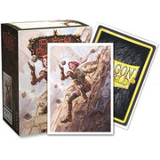 Dragon Shield Sleeves - 100ct Box Matte Art - Flesh and Blood Dash, Inventor Extraordinaire - Matte card sleeves featuring a red-haired female inventor climbing a rock, packaged in a white box with fantasy artwork and.