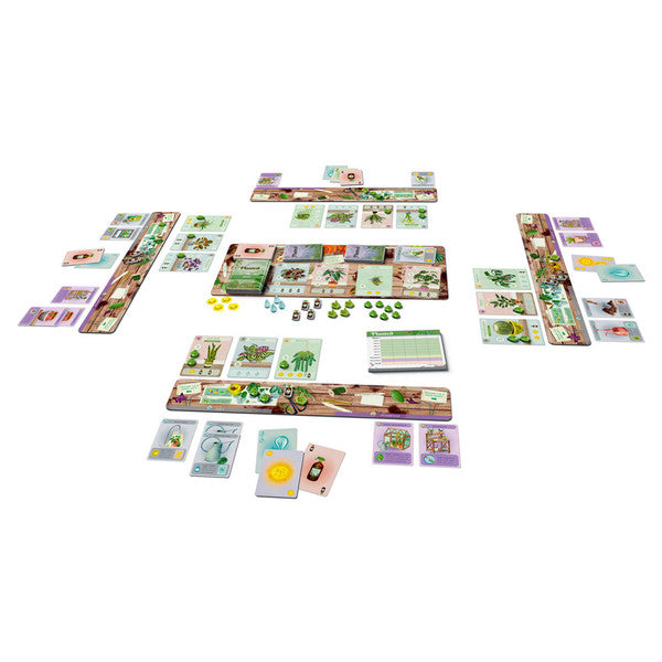 Planted - Board game setup with colorful cards, wooden green tokens, and illustrated game boards arranged for four players.