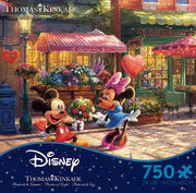 Mickey and Minnie Sweetheart Cafe - 750 Piece Puzzle - Colorful 750-piece Disney puzzle featuring Mickey and Minnie Mouse at an outdoor café with heart-shaped balloons and.