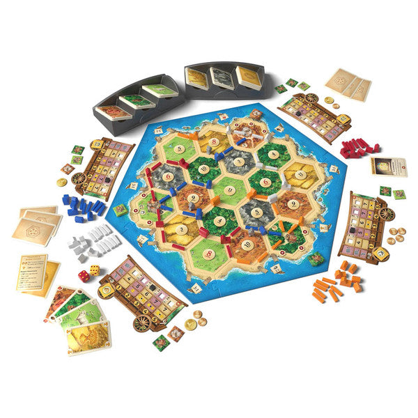 Catan: Traders & Barbarians Expansion 6th Edition - Hexagonal board game with colorful terrain tiles, resource cards, game pieces, and player boards arranged for Catan.