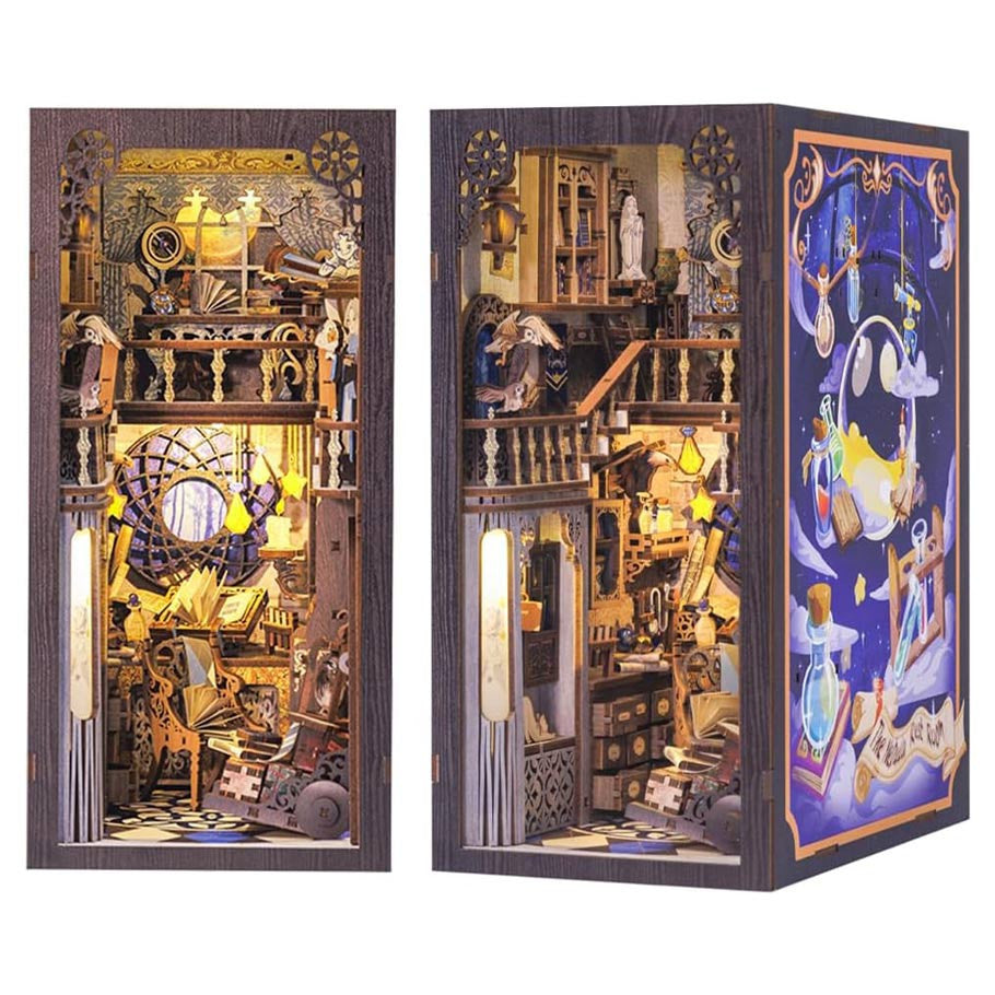 Nebula Common Room Book Nook (PREORDER) - Intricately detailed book nook with warm yellow lighting depicting a vintage study filled with globes, books, and scientific