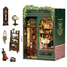 Owl Bookstore Book Nook (PREORDER) - Miniature owl-themed bookstore diorama with intricate wooden shelves, books, and warm lighting.
